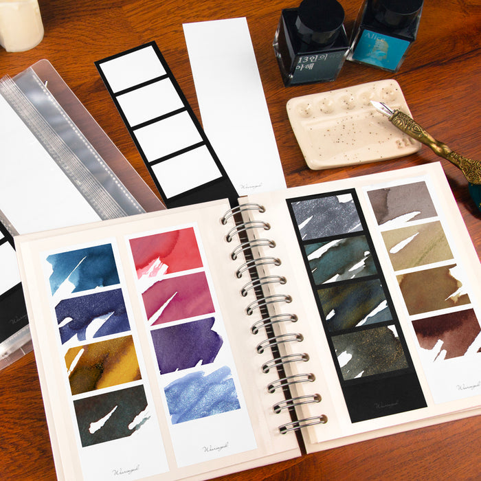 Black - Wearingeul Instant Four Photos Colour Swatch arranged with fountain pen and ink bottles.