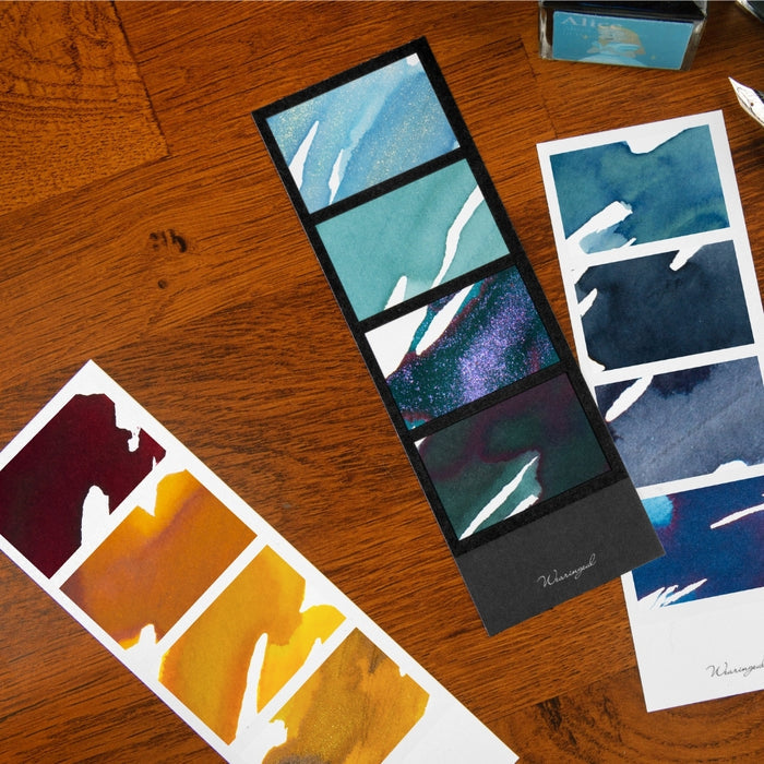 Black - Wearingeul Instant Four Photos Colour Swatch showing assorted ink colours on multiple strips.