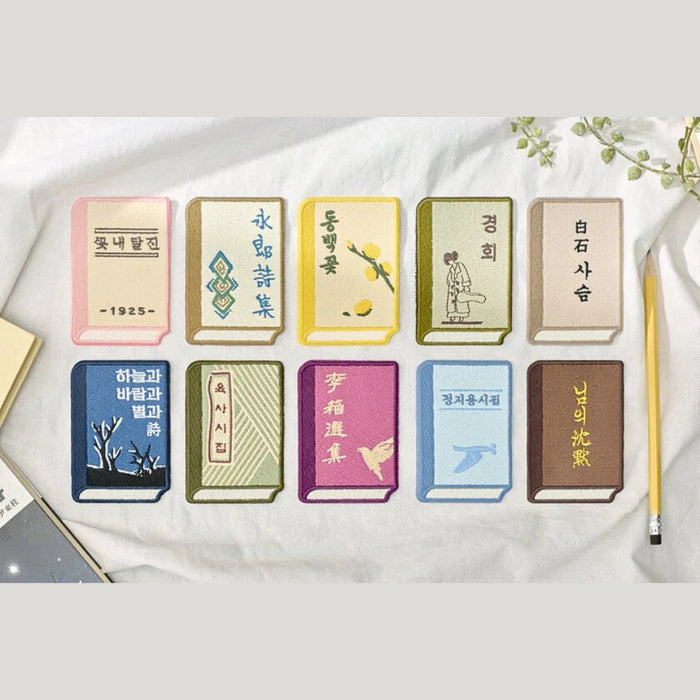 Individual Wearingeul Korean literature embroidery bookmarks shown in a flat lay arrangement.