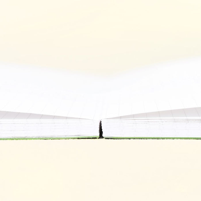 Wearingeul Reservoir Thread B6 notebook open flat showing stitched binding.