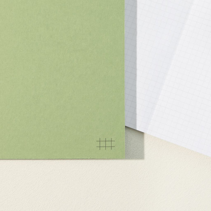 Writing sample inside Wearingeul Reservoir Thread B6 notebook on grid paper.