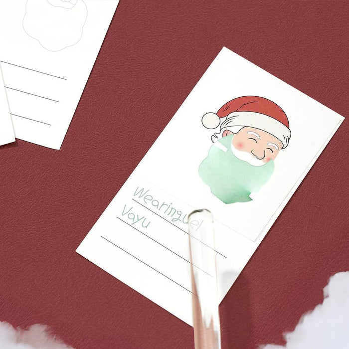 Single Wearingeul Santa Claus Sticker and Swatch card with lined writing space.