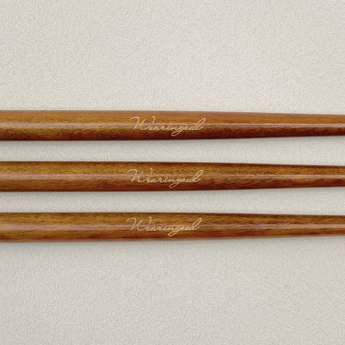 Close-up of Wearingeul wooden dip pen holder showing natural wood grain.