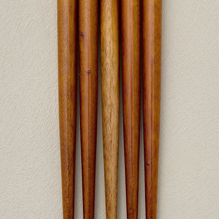 Tapered ends of Wearingeul wooden dip pen holders displayed together.