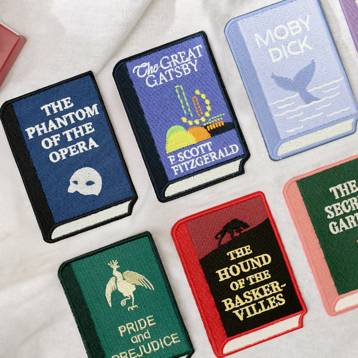 Assorted Wearingeul World Literature embroidery bookmarks featuring different classic book titles.