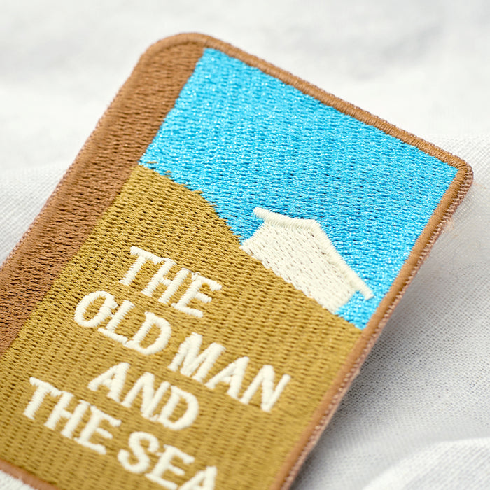 Single Wearingeul World Literature embroidery bookmark with literary-themed cover design.