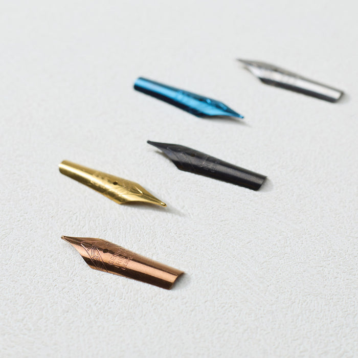 Wearingeul writer’s nibs 40 mm showing different metal finishes.