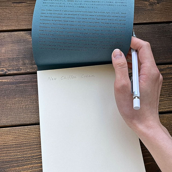 Hand writing on New Chiffon Cream paper inside Yamamoto A5 pad with blue information flap