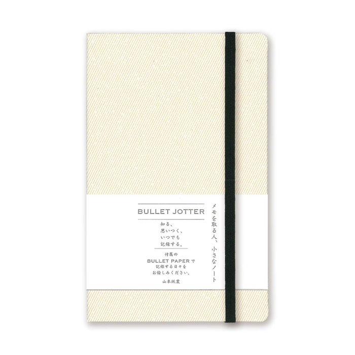 Yamamoto Paper Bullet Jotter – Portable Flat-Open Notebook, close-up view.